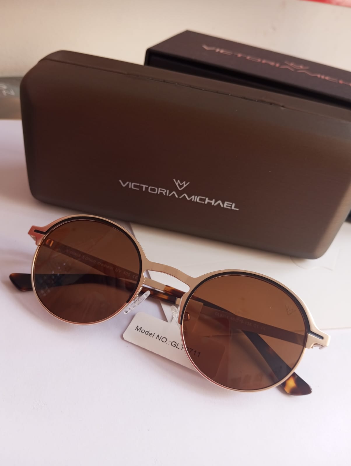 Lunettes solaires rondes aux verres bruns